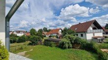 Neubau - Blick vom Balkon Einfamilienhaus mit rollstuhlgerechter Wohnung & ruhigem Garten